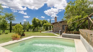 A swimming pool with a stone house in the background. - Il Casaletto by Interhome (Lago di Vico)