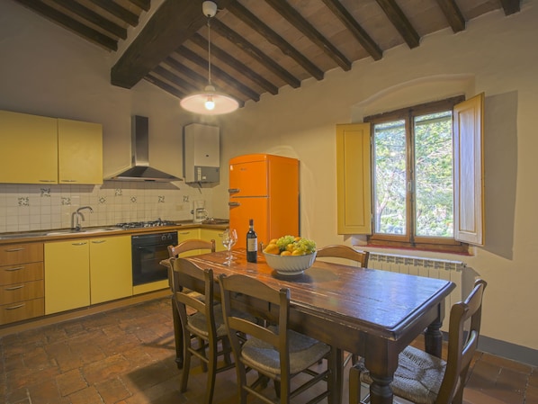 Fridge, oven, high chair, cookware/dishes/utensils