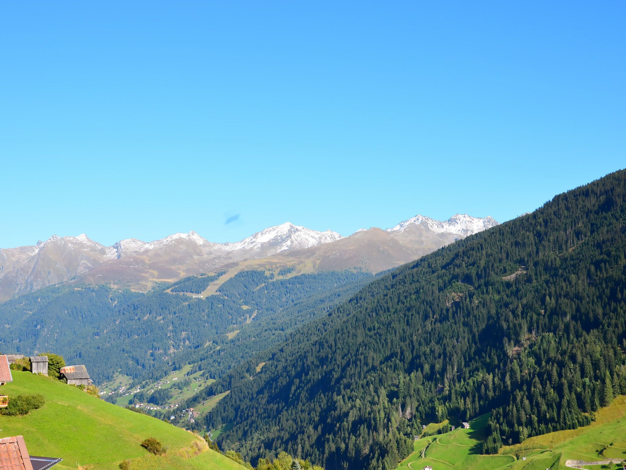 A mountainous landscape with a clear sky.