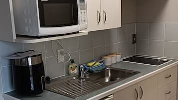 Fridge, microwave, electric kettle, toaster