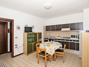 Fridge, microwave, cookware/dishes/utensils