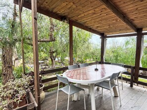 Outdoor dining - Le Terrazze del Geco Bungalow B (SLR301) by Interhome (San Lorenzo al Mare)