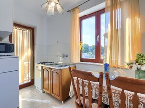 Fridge, microwave, cookware/dishes/utensils, dining tables - Apartment Alba by Interhome (Rovinj)