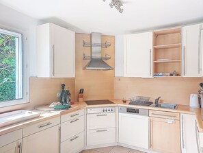 Fridge, oven, dishwasher, cookware/dishes/utensils