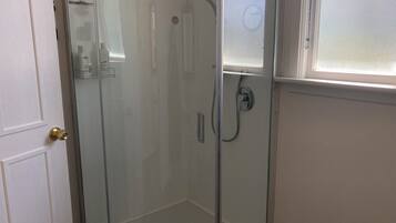 Shower, eco-friendly toiletries, hair dryer, towels