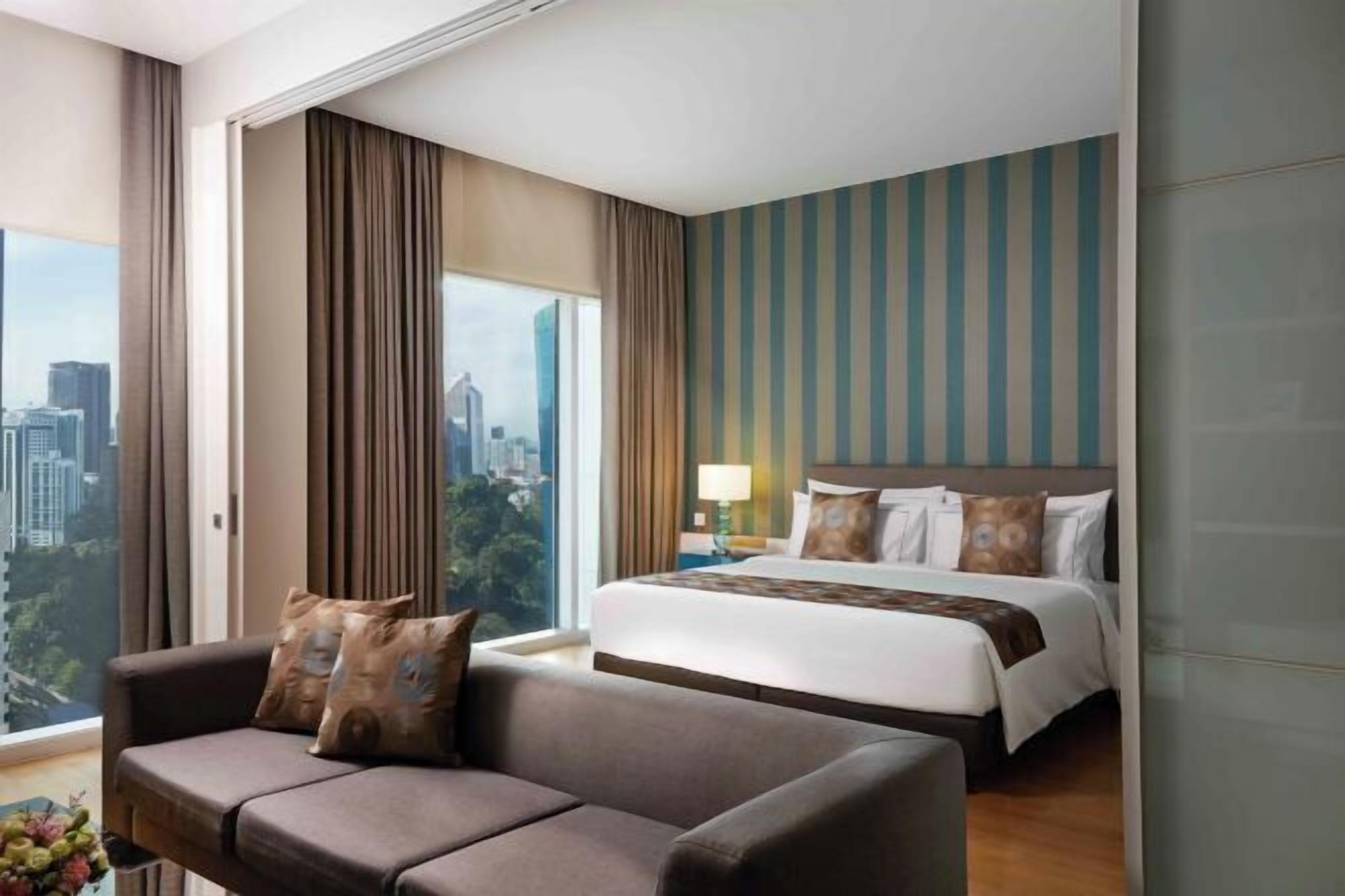 Een kluis op de kamer, verduisterende gordijnen, gratis wifi, beddengoed