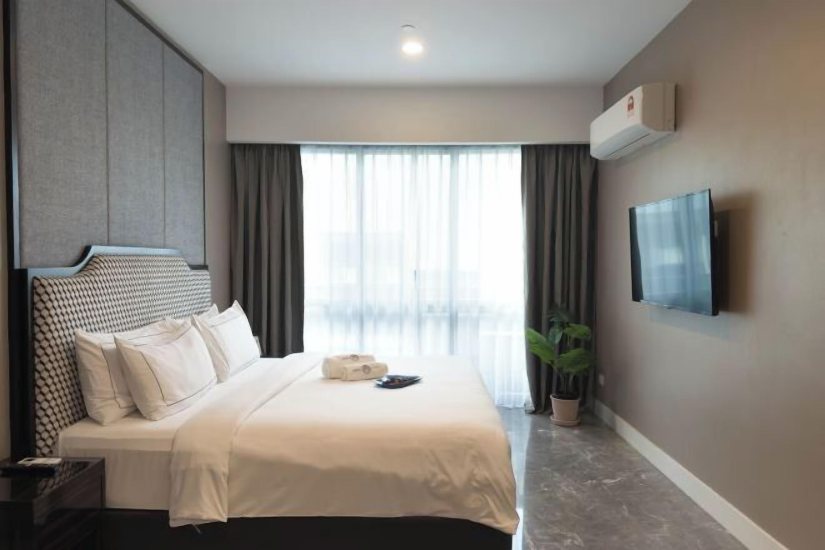 Een kluis op de kamer, verduisterende gordijnen, gratis wifi, beddengoed