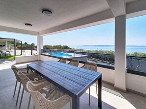 Outdoor dining - Ria with heated pool by Interhome (Trogir)