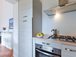 Fridge, oven, cookware/dishes/utensils