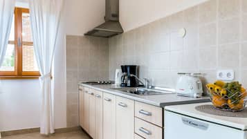 Fridge, toaster, cookware/dishes/utensils