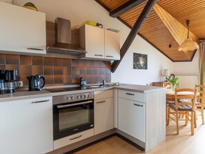 Fridge, oven, toaster, high chair