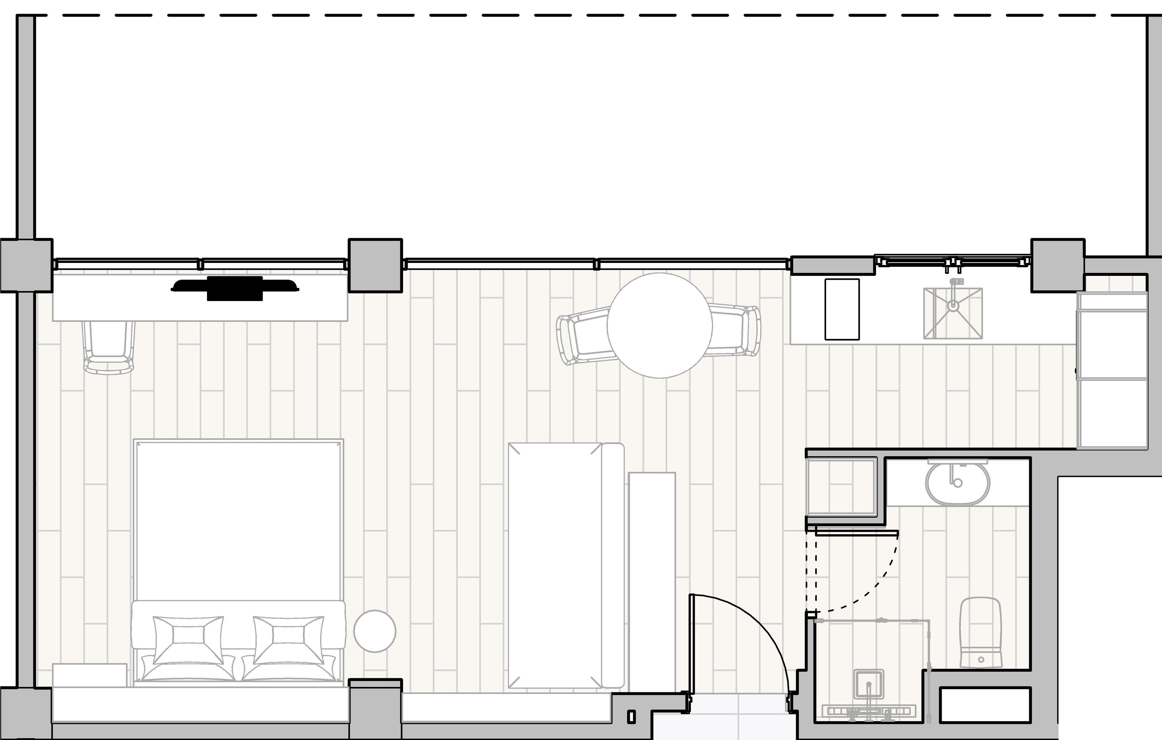 A hotel room layout with a bed, a desk, a chair, a small table, a round table, and a bathroom.