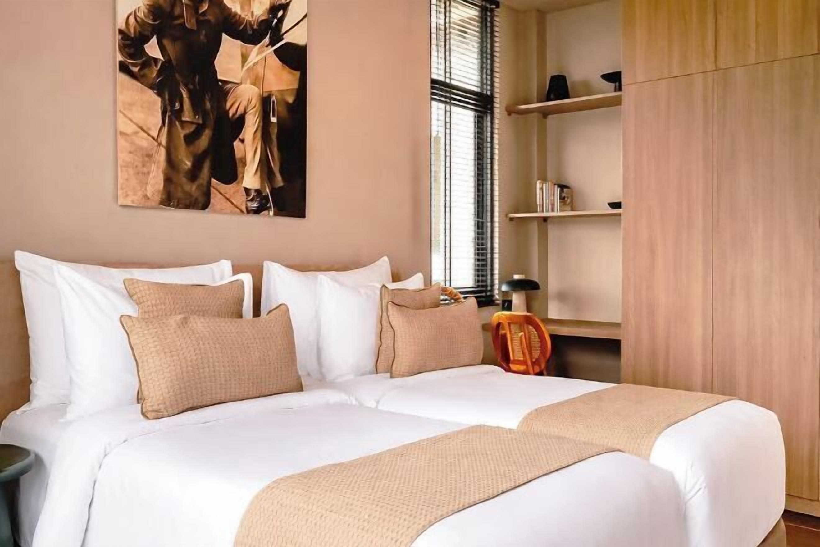 Premium bedding, pillow-top beds, in-room safe, individually decorated