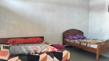 Family Room | Desk, bed sheets