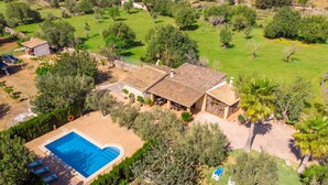 An aerial view of a property with a swimming pool, outdoor seating, and a garden. - Son Catlar by Interhome (Inca)
