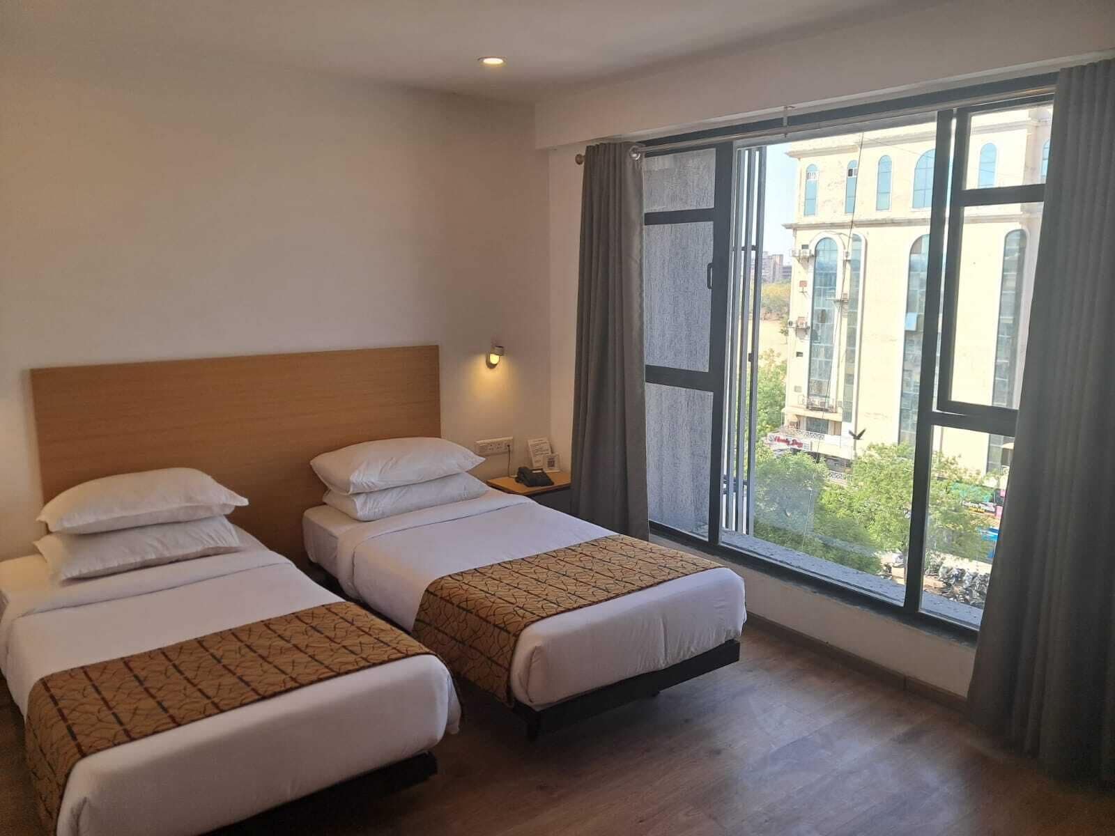 Basic Twin Room, City View | Laptop workspace, iron/ironing board (on request), WiFi (free)