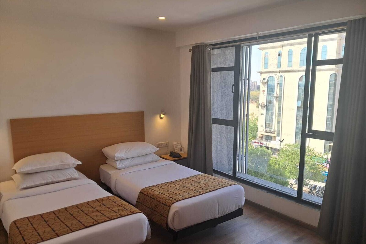 Basic Twin Room, City View | Laptop workspace, iron/ironing board (on request), WiFi (free)