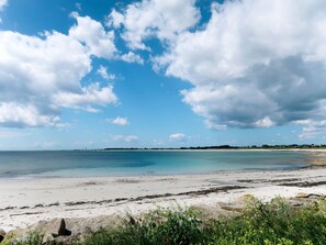 Enjoy a serene beach experience with access to the calm sea.