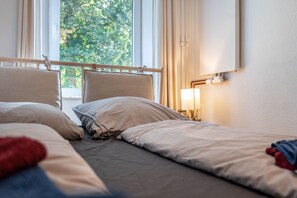 1 quarto, Wi-Fi de cortesia, roupa de cama