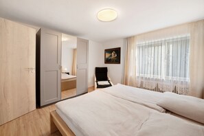 2 dormitorios, tabla de planchar con plancha, wifi gratis y ropa de cama