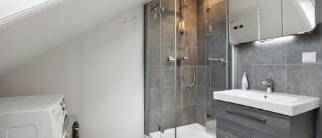 Shower, hair dryer, towels