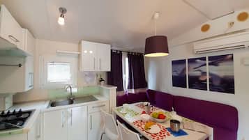 Fridge, microwave, high chair, cookware/dishes/utensils