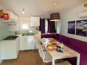 Fridge, microwave, high chair, cookware/dishes/utensils - Campeggio del Forte by Interhome (Marina di Bibbona)
