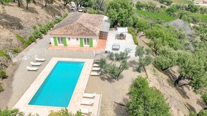 A villa with a swimming pool, surrounded by trees and a vineyard. - Mas des Chênes by Interhome (Grimaud)