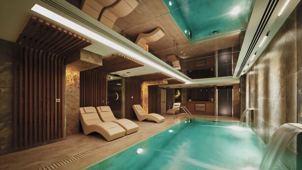 A modern indoor swimming pool with lounge chairs, a waterfall feature, and contemporary lighting. - Grand Galata Hotel & Spa - Special Class (Istanbul)