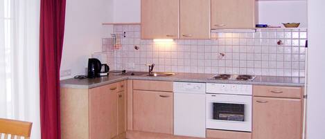 Fridge, dishwasher, toaster, cookware/dishes/utensils
