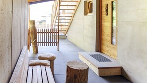 A wooden bench, a wooden stool, and a wooden bench with a fur cushion. - Eberharter by Interhome (Zell am Ziller)
