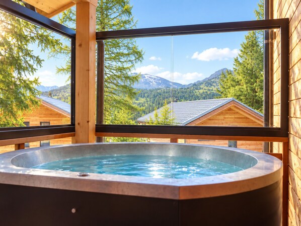 A hot tub with a mountain view.