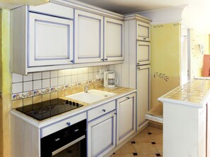Fridge, dishwasher, cookware/dishes/utensils