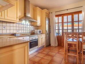 Fridge, microwave, oven, cookware/dishes/utensils