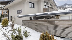 A modern building with a sign reading "Georgen Austria". - Das Georgen, Großglockner+Kitzsteinhorn by Interhome (Bruck)