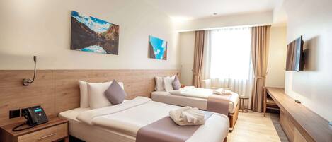 Standard Room, Multiple Beds | Minibar, in-room safe, blackout drapes, soundproofing