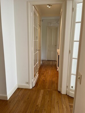Leading to a cozy room with a standard door.