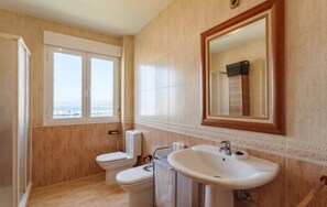 Hair dryer, bidet, towels, soap
