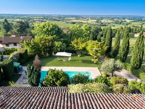 A villa with a swimming pool, surrounded by lush greenery and a view of the countryside. - Ca' del Vento by Interhome (Oltrepò Pavese)