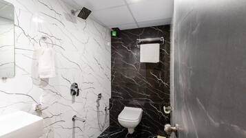 Shower, towels, soap, toilet paper