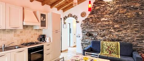 Fridge, oven, cookware/dishes/utensils