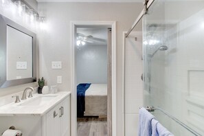 Shower, hair dryer, towels