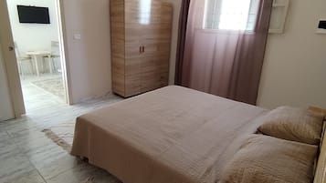 1 habitación y ropa de cama
