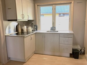 Fridge, microwave, cookware/dishes/utensils