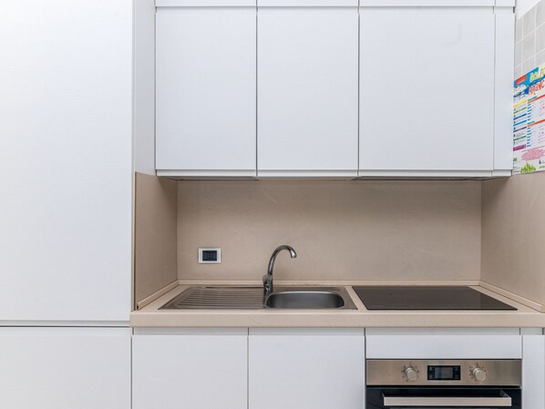 Fridge, oven, dishwasher, high chair