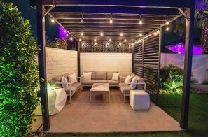 Terrace/patio - Palm Luxe Estate: Luxury Desert Retreat Pool & Spa (Indio)