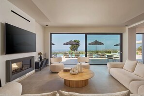 Smart TV, fireplace, video games, table tennis - Gavras Exclusive Villa I, 2 Pools, Gym & SeaViews (9HFX+3FH Arkadi, Greece)