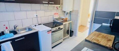 Fridge, microwave, oven, cookware/dishes/utensils