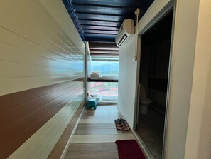 Suíte família | 1 quarto, escrivaninha, espaço de trabalho para notebook, roupa de cama