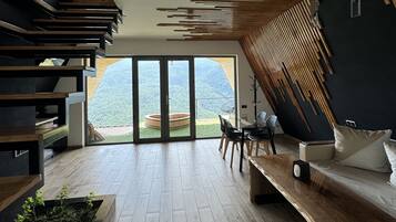 Deluxe Cottage, Balcony, Mountain View | Living area | TV, heated floors